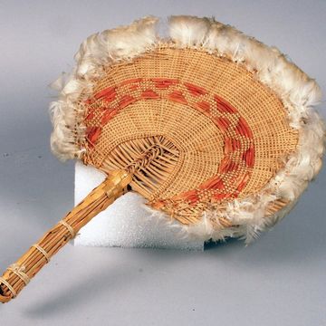 Fan of woven and dyed vegetable fiber with feathers, Oceania