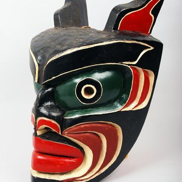 Mask of the being Bookwus (cockle hunter), painted red cedar, Vancouver Island, Canada